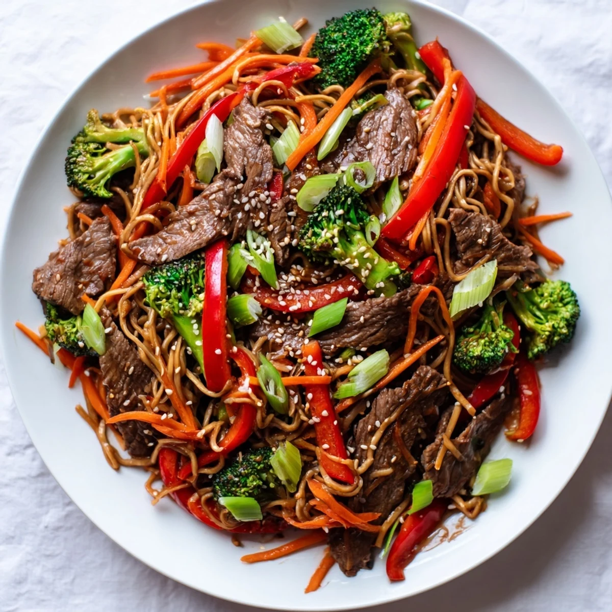 A steaming bowl of Easy Beef Stir-Fry with Lo Mein Noodles, a quick and delicious Asian-inspired dinner.