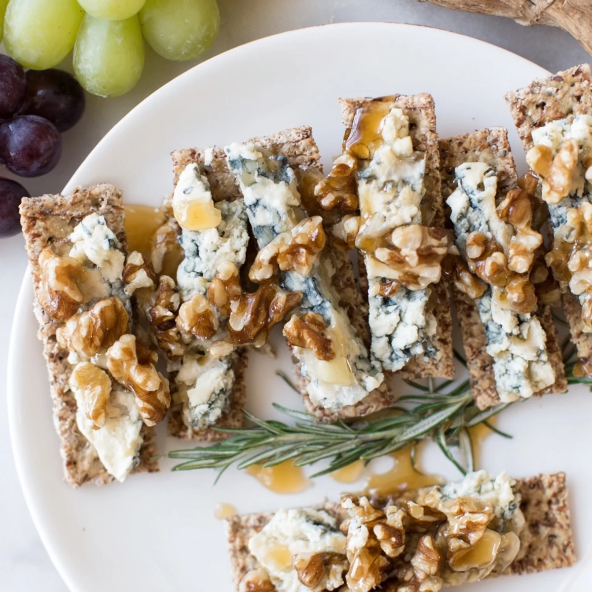 A visually stunning Blue Ridge Mountains cheese platter, ready to be devoured with crispy crackers, grapes.