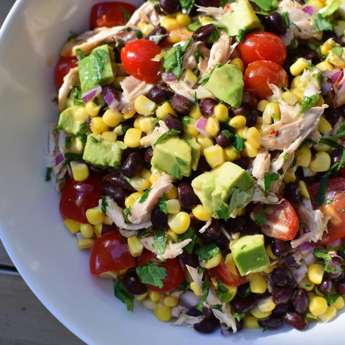 Vibrant picture of Dense Southwestern Bean Salad, a colorful, protein-packed dish with fresh cilantro.