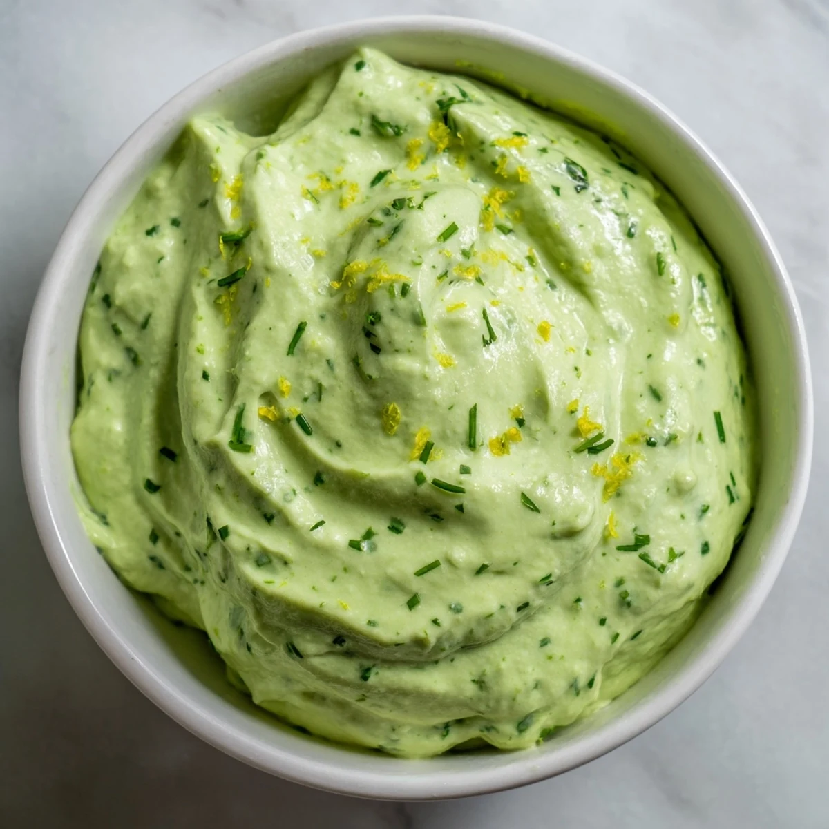 Fresh herbs blend beautifully in this homemade Green Goddess Dip, ideal for dipping or sandwiches.