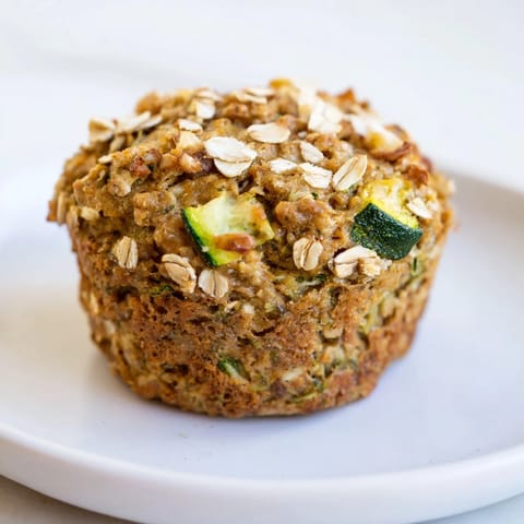 Imagine a stack of sweet, moist freezer-friendly breakfast muffins, fresh from the oven, offering comfort.