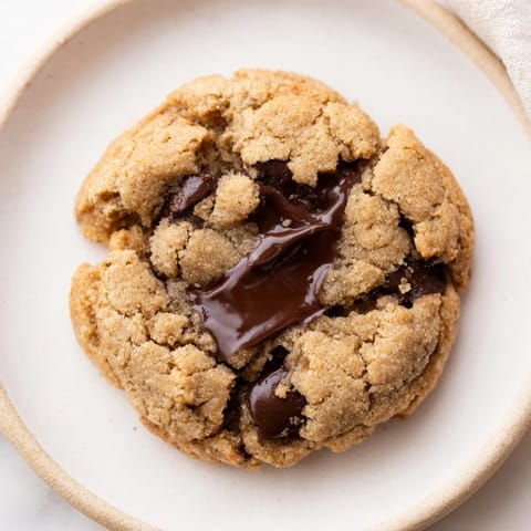 Easy air-fryer chocolate chip cookies featuring melty chocolate chips, ready in minutes with a simple recipe.