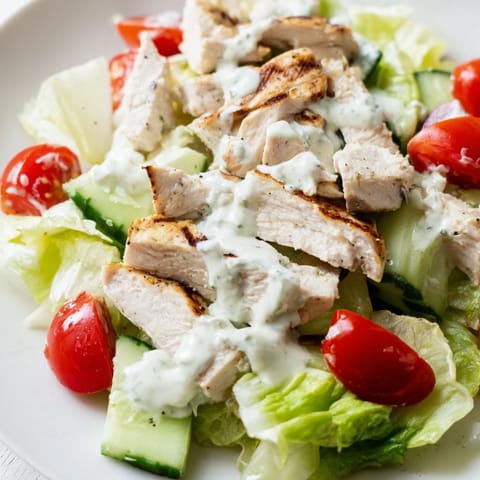 Chopped Jalapeño Ranch Chicken Salad with diced cucumbers and shredded cheddar in a zesty, homemade dressing.  