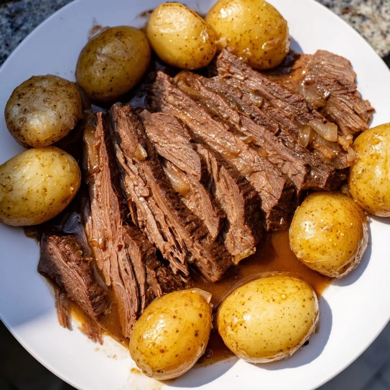 Hearty Simple 4-Ingredient Slow Cooker Pot Roast; a comforting American classic.